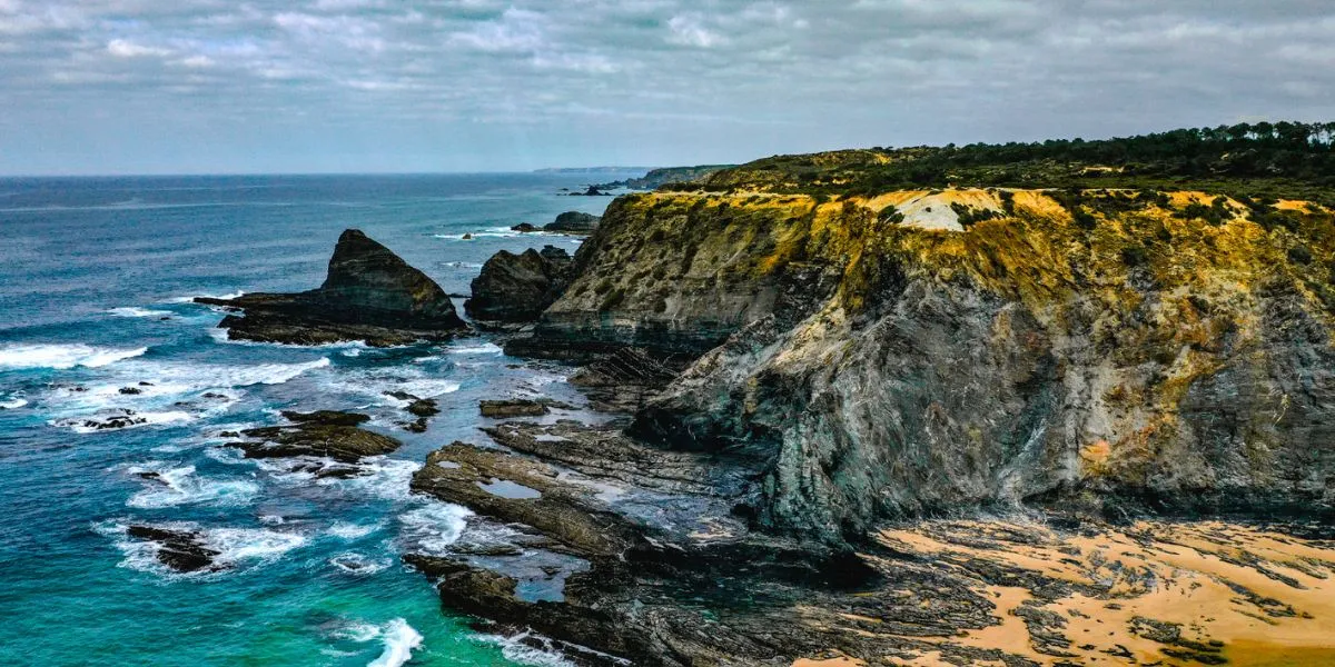 Dark-Geological-Formations-and-Sea-Stacks-Odeceixe-Beach-Trail